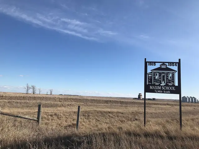 Maxim School historic sign on the prairie
