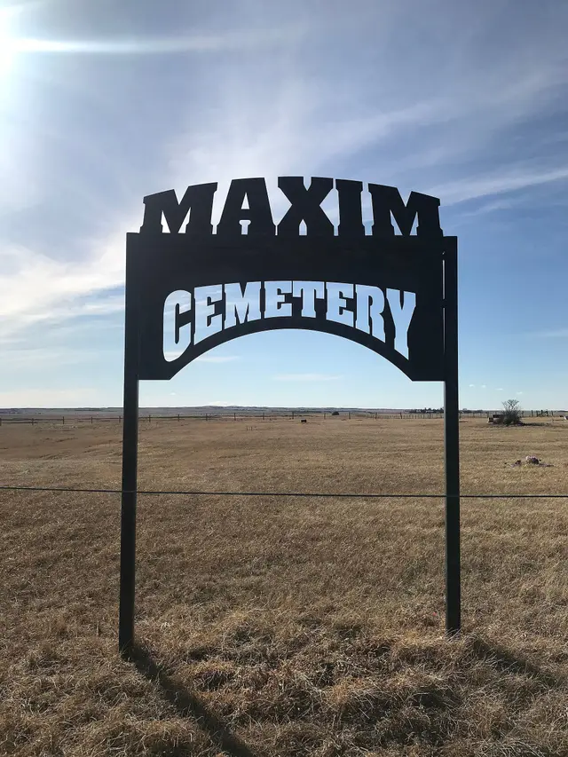 Maxim Cemetery sign on the prairie